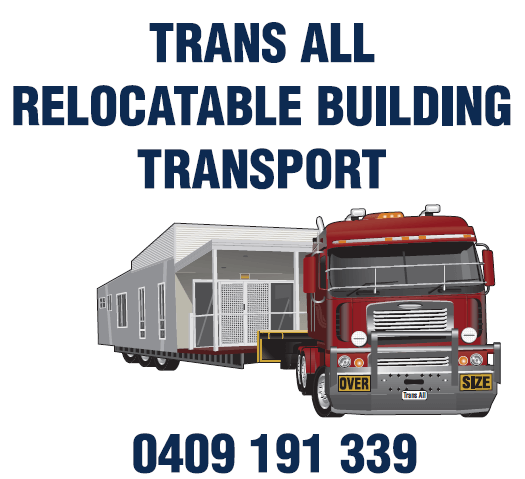 Trans All Transport truck towing a cabin